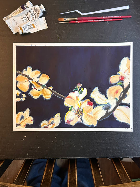 Stella & Dorrie Studio's original painting of a dogwood radiant blossoms against a rich dark blue background. 