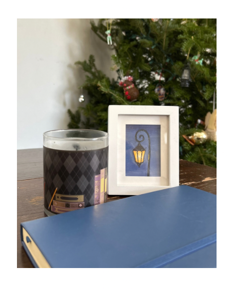 Original painting of glowing old fashioned street lamp against blue sky.  Framed in white 3x4 inch frame.